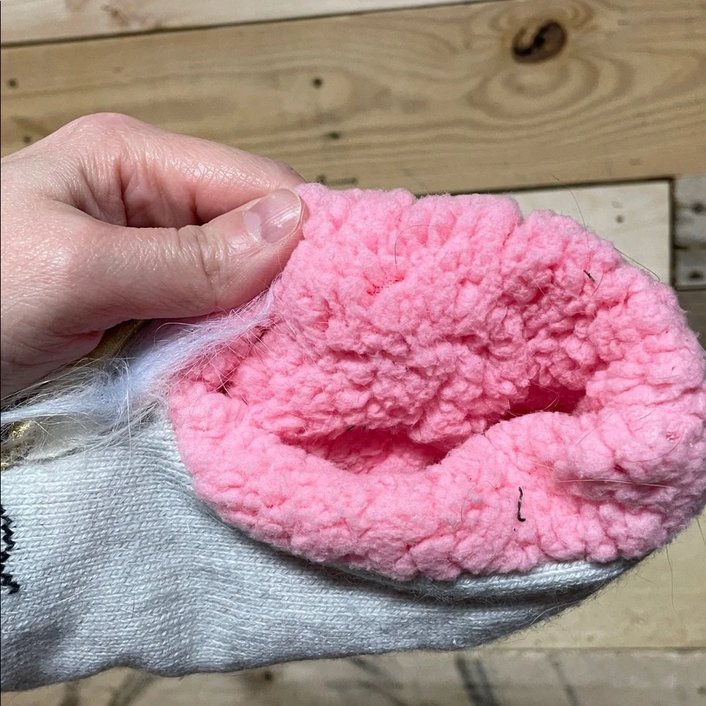 One Maurices brand boot socks and Unicorn Slippers